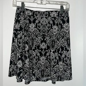 Women’s size medium skater skirt black with white floral pattern